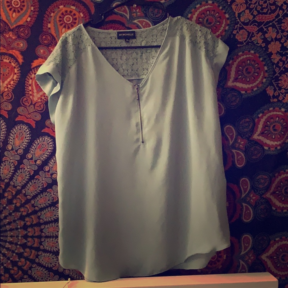 Very cute teal blue top